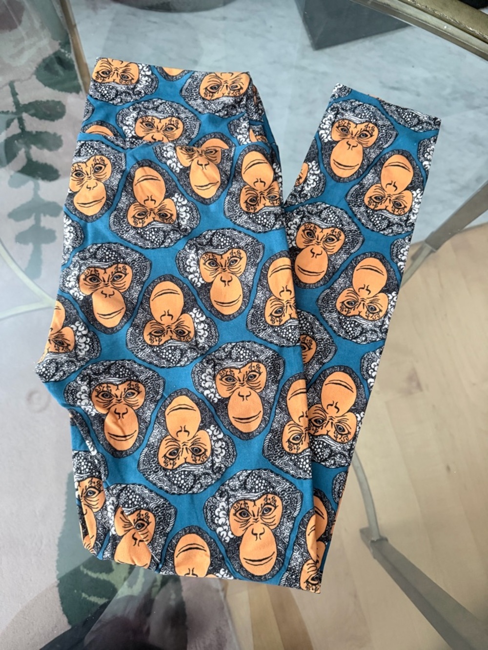 LuLaRoe Blue Leggings with Orange Monkey Faces